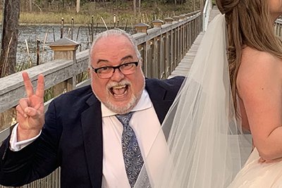 Things To Do https://emeraldbeachproperties.icnd-cdn.com/images/thingstodo/Officiant Doug.jpg